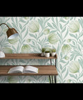 Top Shelf Botanical Modern Wallpaper With A Smooth Matte Linen Texture Pvc Free Heavy Duty Covering For Kitchens Baths Or Hallways Paste To Paper Built Tough For Daily Grind Ordered Fresh Just For You on a decorated wall with a wooden shelf and plants.