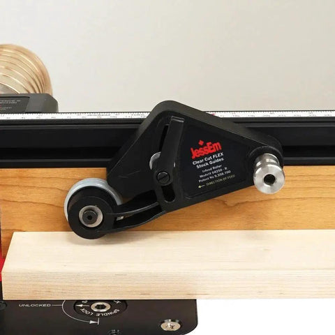 Heavy Duty Flex Stock Guides For Table Saws And Router Tables with smooth rollers on a wood surface.