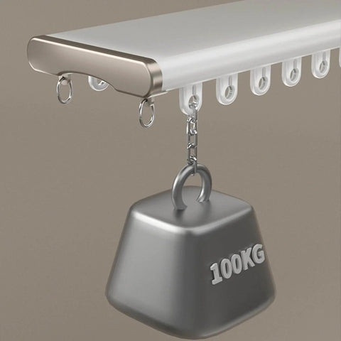Close-up of heavy duty ceiling curtain track system with double rails and 100kg weight, white finish, mounted sample.