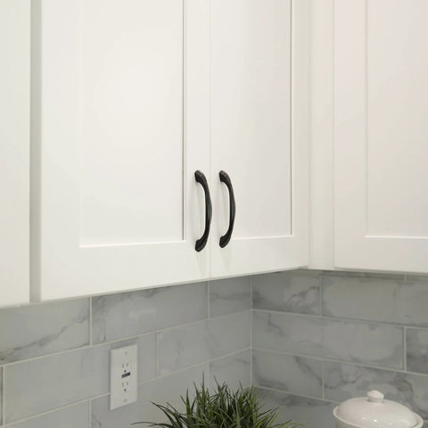 Oil Rubbed Bronze Cabinet Pull Handle Six And A Quarter Inch Length Five Inch Center To Center Traditional Classic Style on white cabinets.