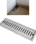 Oreilet Linear Shower Drain 12 Inch Floor Drain with Hair Catcher installed in a bathroom floor.