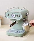Retro Style Electric Coffee Maker Semi Automatic Espresso Machine With Steam Milk Frother And Glass Carafe Light Green American Plug close-up of steam wand and frothing pitcher