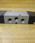 Rexroth Bosch Group 0-1313 Solenoid Valve Quarter Inch NPT Thread 120 VAC 50 To 60 Hz 4.3 VA Coil, top view on wooden surface