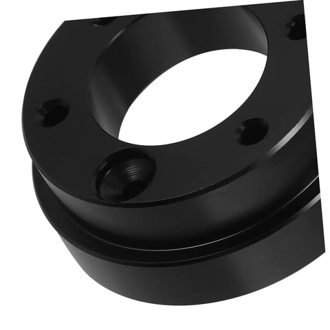 Close-up of metal Racing Car Riser Adapter Plate Auto Accessory For Enhanced Comfort And Precise Control Fits Multiple Car Models