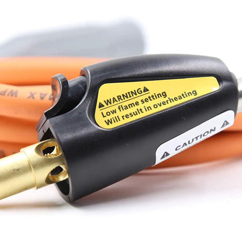 Double Valve Self Ignition Torch For MAPP And Propane Soldering with 60 inch hose, close-up of warning label on ignition switch