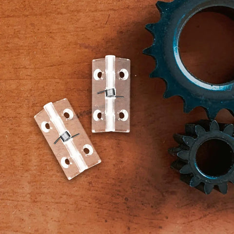 Six Pack Acrylic Self Closing Concealed Door Hinges With Spring Mechanism 45x35mm in transparent design on wood surface