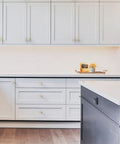 Modern kitchen with Brushed Gold Cabinet Knobs 10 Pack Single Hole 2 Inch Solid Zinc Alloy Cupboard Drawer Knobs For Kitchen Cabinets T Bar Hardware ZH0003 Durable Finish For Long Lasting Use In High Traffic Cabinets.