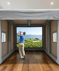 Person practicing in Inflatable Golf Practice Cage 5m L By 4m W By 3.3m H for indoor outdoor training with HD projection screen.