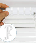 Top Shelf 12 Pack Of 1 Inch White Plastic Valance Clips For Window Blinds Lock In Your Trim With Zero Hassle this image shows installation of clips.