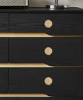 Three champagne bronze drawer knobs on a black dresser, showcasing the Ten Pack Kitchen Cabinet Knobs And Champagne Bronze Drawer Knobs Made From Heavy Duty Zinc Alloy Hardware That Delivers A Killer Finish And Hella Sturdy Feel For Any Modern Home Makeover Project.
