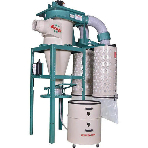 Heavy Duty 5 Horsepower Cyclone Dust Collector Keeping Your Garage Drop Dead Clean With 215 Square Foot High Efficiency Filtration, 5HP, mounted on a shop wall.