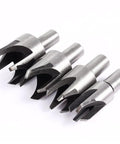 Built Tough Heavy Duty Eight Piece Wood Plug Cutter Set Forged From Premium Carbon Steel To Knock Out Screw Holes And Restore Furniture Fast Features Tapered Half Inch Round Shank Four metal plug cutters laid out in a row.