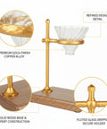 Premium Heavy Duty Copper Alloy Pour Over Coffee Dripper Stand With Weighted Stable Cone Filter Holder For Smooth Top Shelf Brewing Station Setup Game Changer close-up of refined detail with fluted glass dripper and solid wood base.