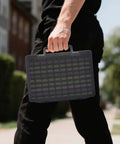 Boss Grade Slick USB Flash Drive Case With A Legit 104 Slot Layout, black, carried by a person outdoors.