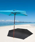 Heavy Duty Waterproof 10x10 Tarpaulin Ground Cover For Outdoor Camping shown on sandy beach with blue umbrella