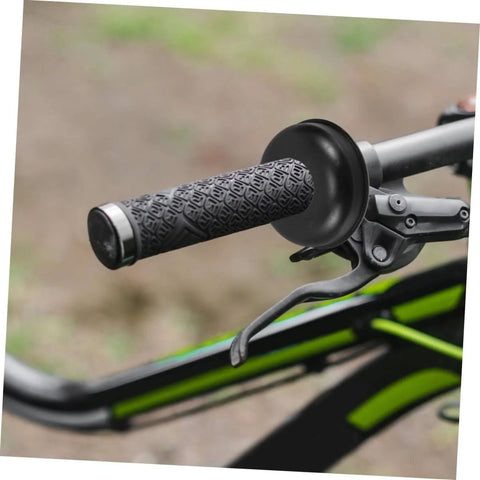 Close-up of a bicycle handlebar with textured grip and brake lever, part of the 20 Piece Bicycle Axle Washer Kit With Steel Bowl Gaskets And Seal Fittings For Mountain Bike Front And Rear Repair Ride Ready Protect Bearings And Guard Against Dirt Extend Bike Life.