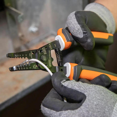 Electrician Insulated Wire Stripper And Cutter With 1000V Rating And VDE Certified Three Part White Warning Insulation in use
