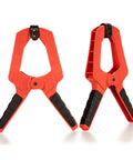 9 Inch Heavy Duty Spring Clamps With Kickass Grip Rock Solid Build Hella Durable Engineering Plastic And Soft Bi Material Handles Sweet For Woodworking And Quick Shop Fixes 2 Piece Set, features red clamps with rubber grips.