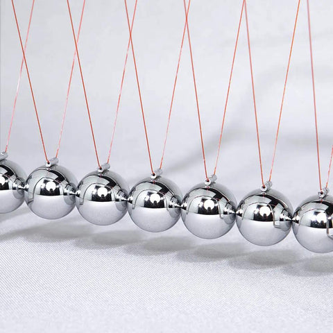 7 Ball Newton's Cradle Pendulum Desk Toy With Classic Swing And 30 Plus Second Swing Time, Chrome Iron Construction close-up