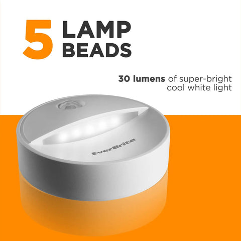 Close-up of Motion Sensor Night Light With Auto On Off, No Fuss Cool White LED Path Light, circular design with label visible.