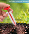 Hand using compact handheld seed spreader for precise sowing in lawns, gardens, and planters, mini seed distributor tool easy to grip