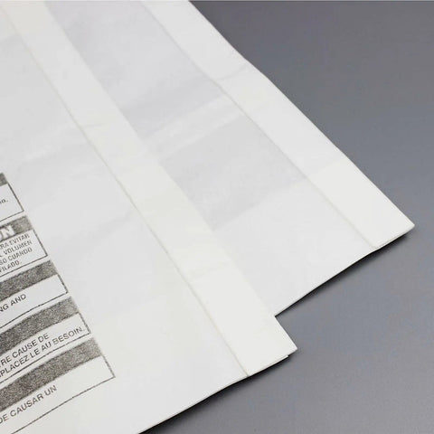 Close-up of folded vacuum filter bags showing product label, part of 10 Pack 5 to 8 Gallon Vacuum Filter Bags Type E And Type H Replacement Dust Bags For Vacuums With 2.5 Inch Nozzle Fit Compatible With 90661 9066100 9066133 90671 9067100 9067133 Bundle.