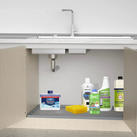 Under Sink Mat For 36 Inch Cabinets Silicone Waterproof Liner Protects Against Leaks Drips And Spills Gray 35 By 22.5 Inch Holds Over 3 Gallons Keeps It Dry Easy Clean Up With Durable Silicone Non Slip Edges For Quick Hassle Free Maintenance under kitchen sink with cleaning products and supplies displayed on mat