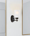 Phoebe 8 Inch Modern Wall Sconce with frosted seeded glass cylinder shade, oil rubbed bronze, bathroom lighting