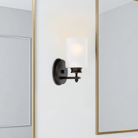 Phoebe 8 Inch Modern Wall Sconce with frosted seeded glass cylinder shade, oil rubbed bronze, bathroom lighting