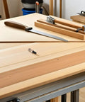 Wooden table with tools and Grandfather Clock Weight Replacement Kit With Vintage Shell Hanging Hook And Nut Set M6