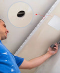 Man installing Top Shelf Six Pack White Ceiling Cover Plates 12 Inch Wall Hole Covers over a drywall hole.