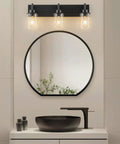 Matte Black 3 Light Vanity Wall Sconce With Clear Glass Shades For Bathroom Bedroom Hallway Or Kitchen Dope Farmhouse Style Lighting Fixture That Elevates Any Space And Sets The Mood above a round mirror in bathroom