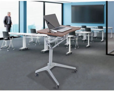 Solid As A Rock Adjustable Lectern And Podium Stand With Grease Free Casters in office, featuring laptop on wooden surface.