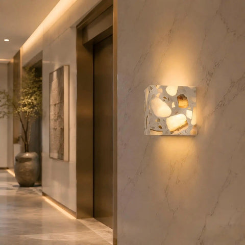 4.7" Mid Century Modern Wall Sconce, Minimalist Terrazzo Wall Light Fixture illuminating a stylish hallway.