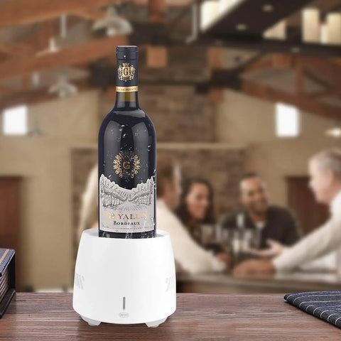 Portable Car Cup Beverage Cooler With Electric Adapter And 350ML Mug 24 Hour Semiconductor Fridge cooling a wine bottle.