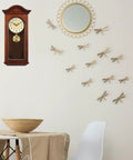 Gold Metal Clock Pendulum Replacement For Traditional Quartz Wall Clocks With Accurate Timekeeping shown in home setting