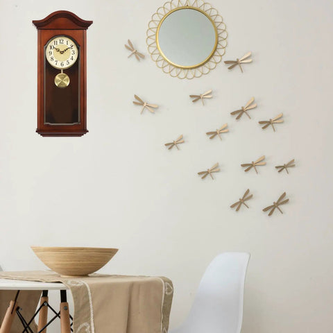 Gold Metal Clock Pendulum Replacement For Traditional Quartz Wall Clocks With Accurate Timekeeping shown in home setting