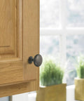 Oil Rubbed Bronze Edona One And A Quarter Inch Cabinet Knob Set, 10 Pack on wooden cabinet door, elegant traditional look