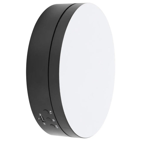 Upgrade Your Game With This Sick Electric Rotating Display Stand Boasting 3 Speeds And 4 Adjustable Angles For Showcasing Jewelry Watches And Cosmetics Like A Boss On A Sleek Black Mirror Surface Turntable Base - black circular turntable with USB controls.