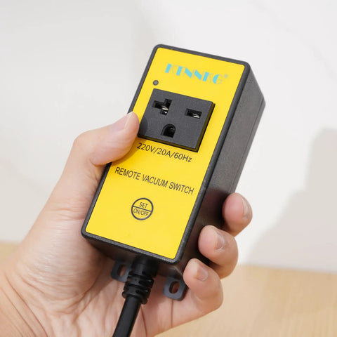 220V Rock Solid Plug And Play Remote Switch With Dead Simple One Touch Control for woodworking dust collectors in hand.