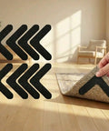 8 Pack L Shaped Rug Grippers, Washable Anti Slip Tape placed under rug corner on hardwood floor