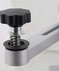Close-up of tilt arm adjustment knob of High Caliber 120 Volt Electric Circular Saw Blade Sharpener Packed With Diamond Emery Wheels Portable Aluminum Base Adjustable Tilt Arm For Hella Clean Cuts And Slick Daily Grind.