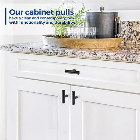 Matte Black 2 Inch Cabinet Knobs 30 Pack Stainless Steel Kitchen Cabinet Knobs installed on white kitchen cabinets with round edge.