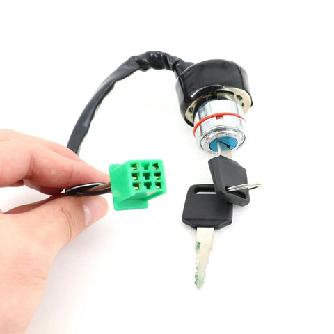 Universal Motorcycle Ignition Switch Lock Key Kit For Dirt Bikes, ATVs, And UTVs shown with key and green connector