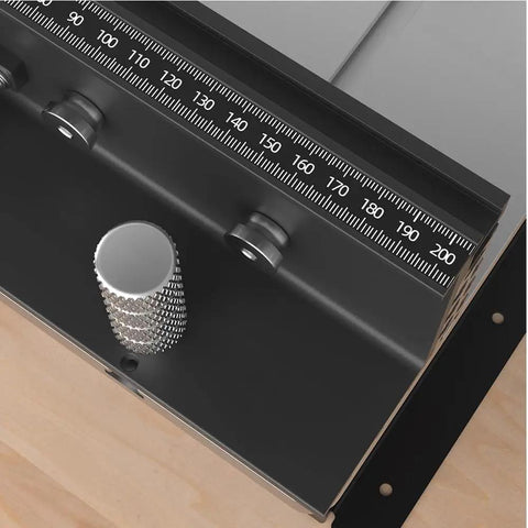Close-up of Rock Solid Bench Top Router Table Built Like A Tank For Real Shop Work Portable 16 Inch Work Height showing precise measurement scale.