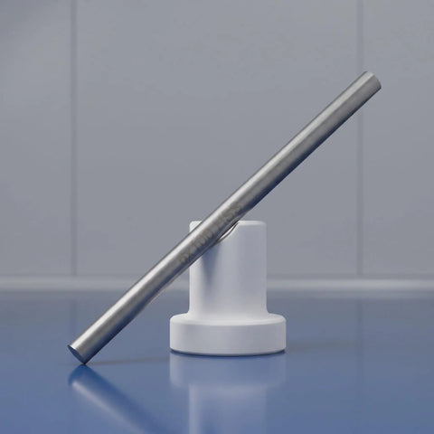 Real Deal Heavy Duty 5 Pack 5Mm X 100Mm Stainless Steel Precision Shaft Rod displayed on a white stand for RC car axle replacement.