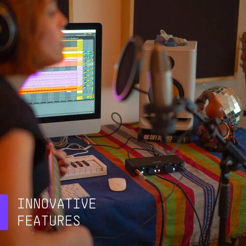Musician using MiniFuse 2 USB Audio And MIDI Interface For Recording, Production, Podcasting, And Guitar in home studio.