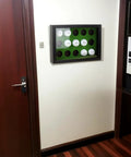 15 Ball Golf Ball Display Case Wooden Shadow Box With Acrylic UV Dust Cover Wall Mount in an office setting