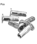 Dead Strong 1/4-20 Multi Grip Rivet Nuts With Pre Bulbed Shank For Lock Tight Threads In 304 Stainless Steel Made For Rough Shop Floors And No Sweat Vehicle Repairs Simple Hand Install Five Pack Deal - 5 rivet nuts arranged showing shiny stainless steel finish.