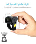 Person holding Ring Wearable 1D Barcode Scanner For Hands Free Scanning Bluetooth 2.4G Wireless Or USB Wired Mini Bar Code Reader
